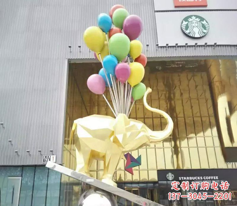 广西不锈钢踩球的小象雕塑