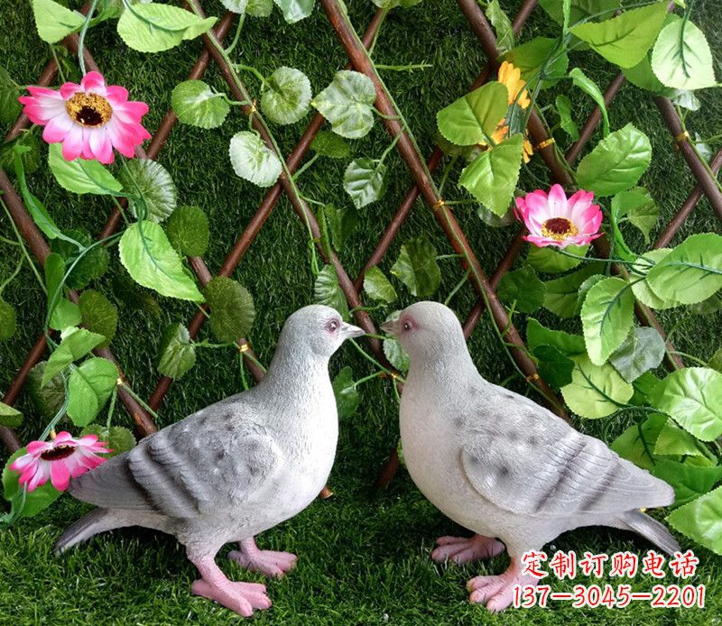 广西雕塑小女孩一只手拿书一手和平鸽