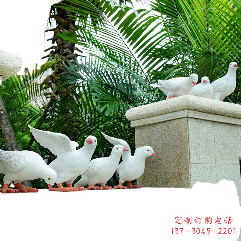广西雕像上的鸽子