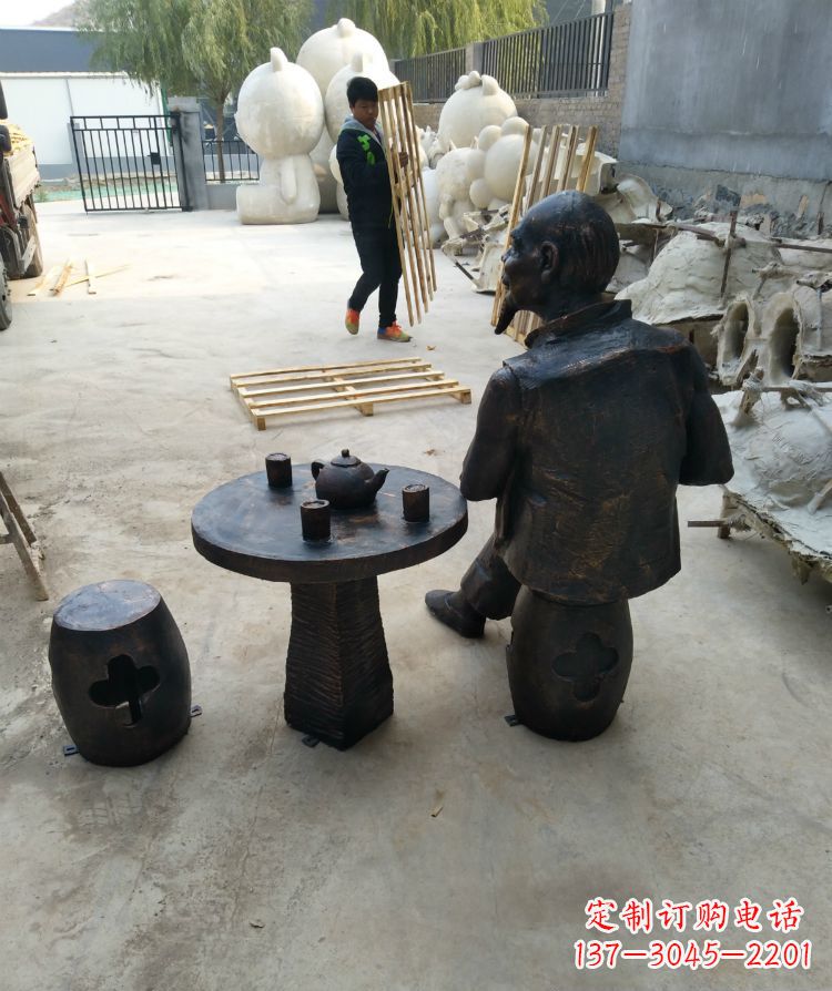 广西公园喝茶的老人铜雕