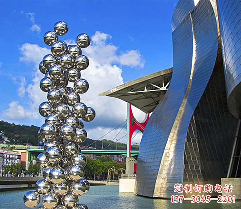 广西高端不锈钢抽象龙柱雕塑