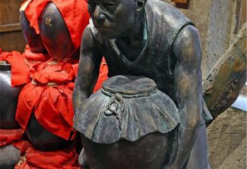 广西铜质老人抱酒图案雕塑