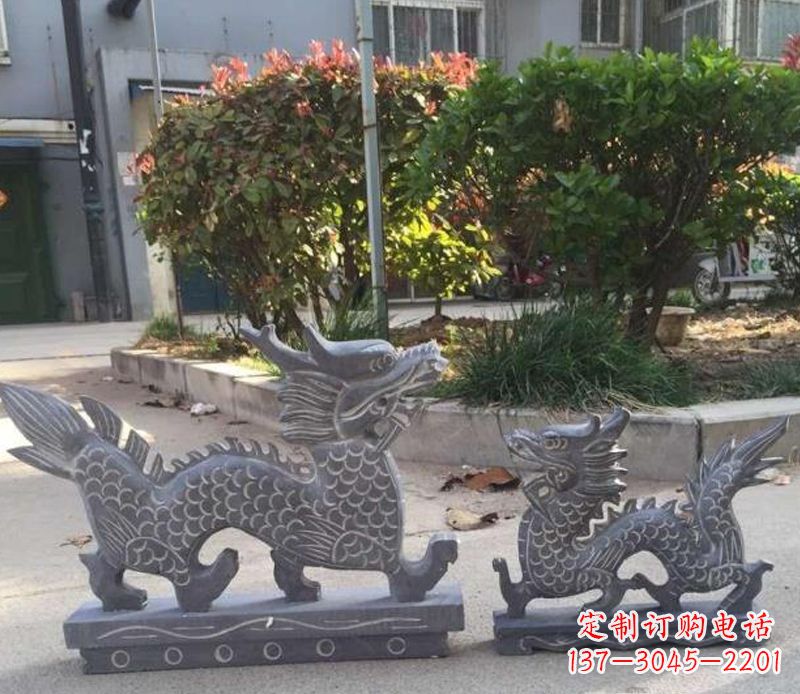 广西青石雕刻母子龙是由中领雕塑工厂家生产的一…