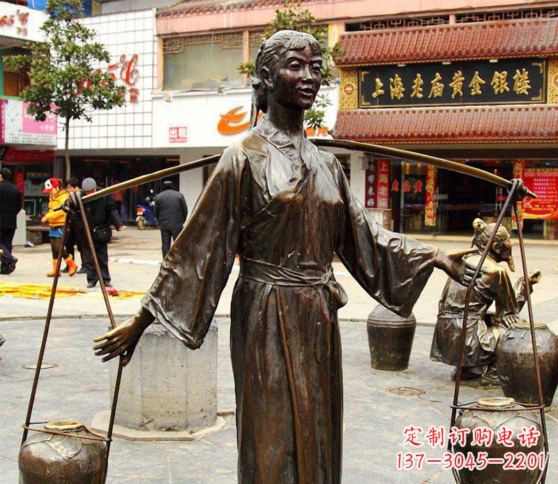 广西挑着罐子的古代女人铜雕