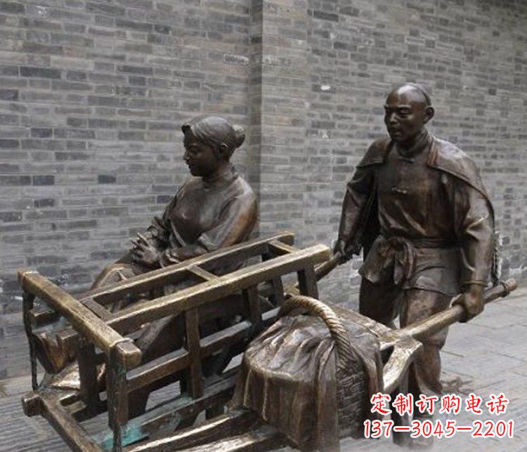 广西推独轮车的人物铜雕