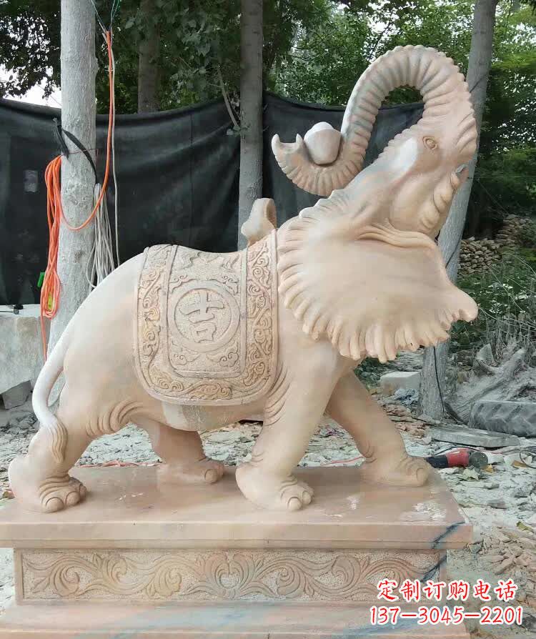 广西晚霞红卷元宝大象雕塑