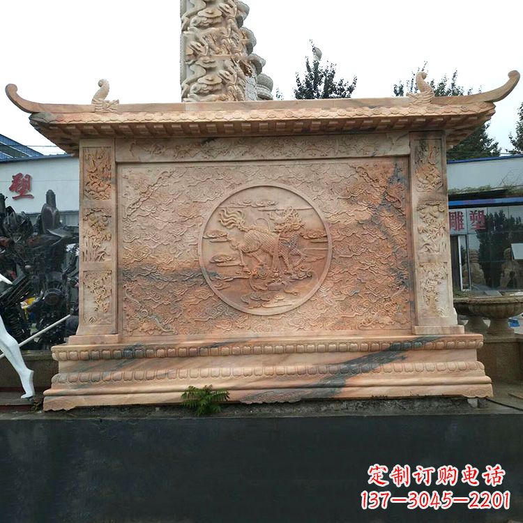 广西晚霞红麒麟影壁墙石雕