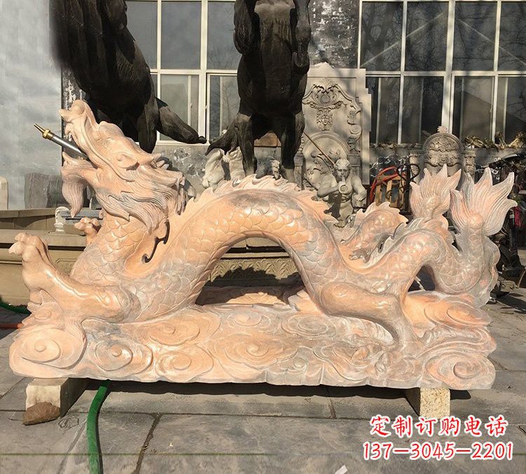 广西晚霞红石雕喷水龙