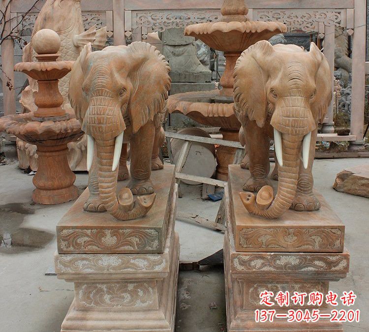 广西晚霞红石雕元宝大象