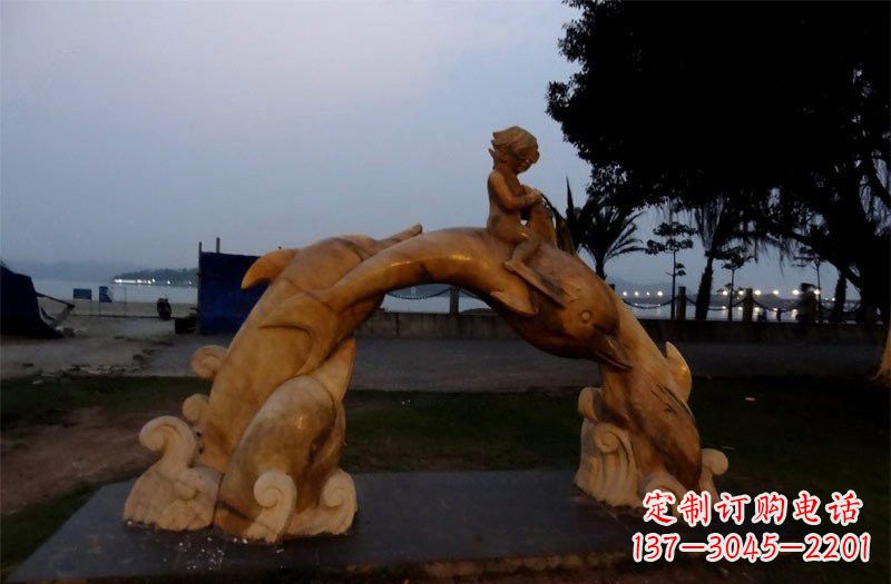 广西西方儿童骑海豚石雕