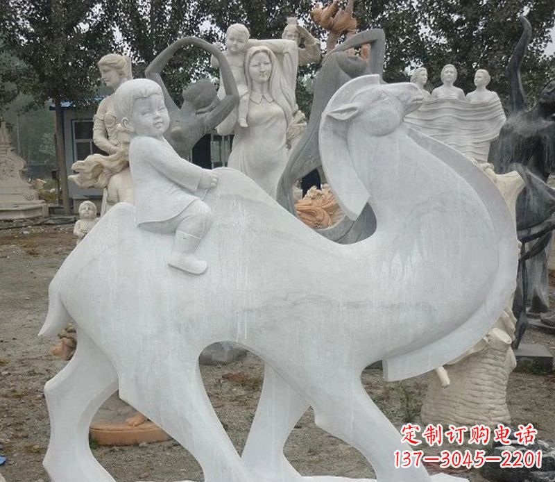 广西小孩骑骆驼石雕