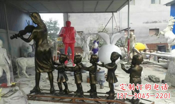 广西校园老师和儿童铜雕