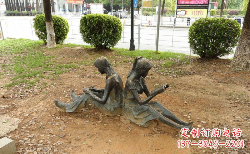广西校园坐着看书的女孩人物铜雕