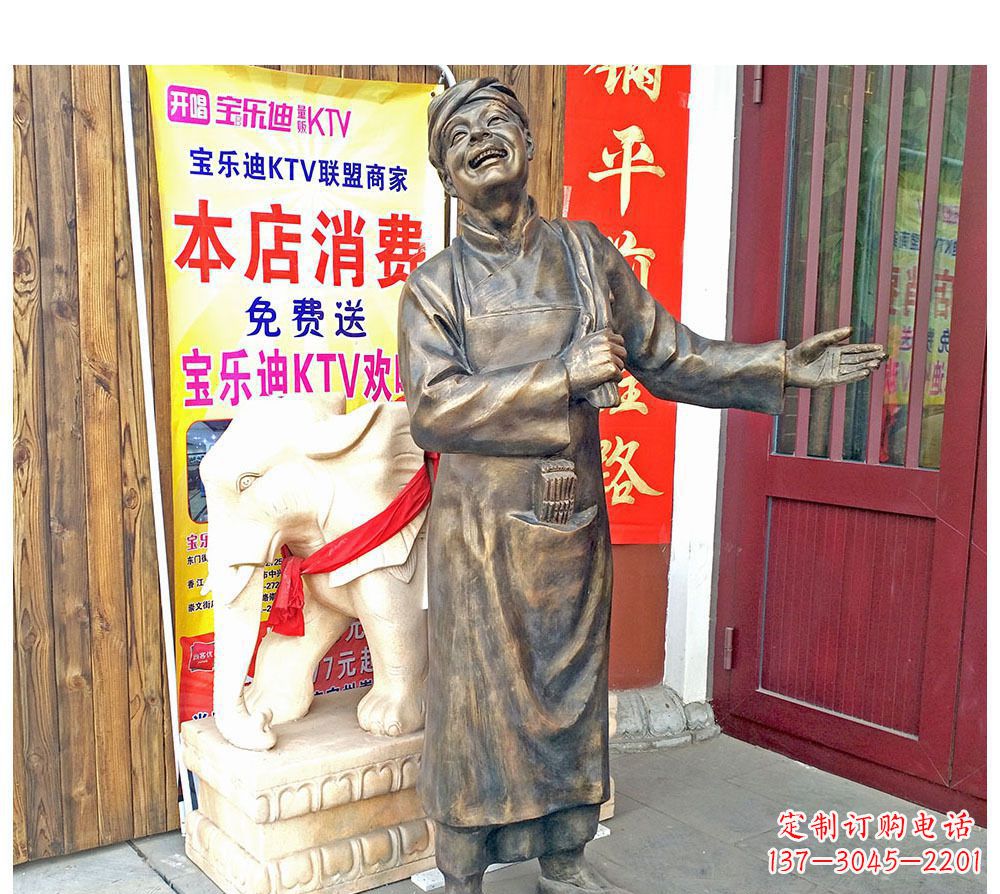 广西迎宾的店小二铜雕